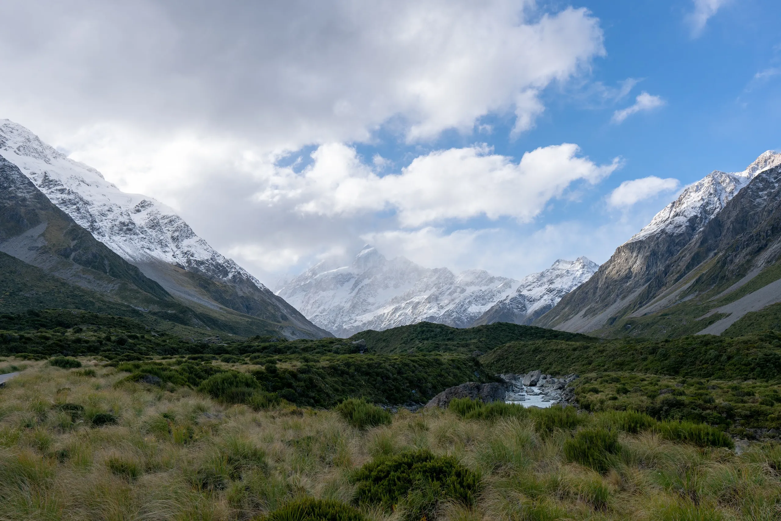 The cloud was clearing as we exited along the trail and Aoraki became almost fully visible